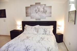 Postel nebo postele na pokoji v ubytování B&B GDA