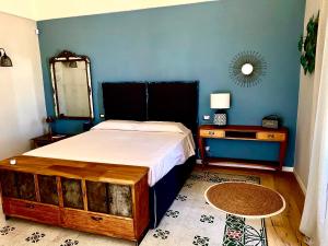 Posteľ alebo postele v izbe v ubytovaní Villa “La quagliara “ sea view
