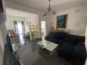 A seating area at CASA REFORMADA CON TERRAZA/WIFI/AIRE ACONDICIONADO