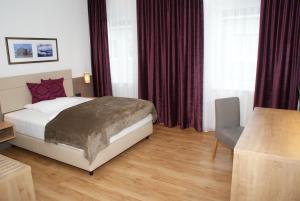 Postel nebo postele na pokoji v ubytování Hotel Mühlviertler Hof