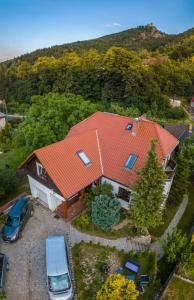 an aerial view of a house with a red roof at Pokoje Orle Gniazdo in Jelenia Góra