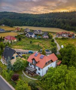 an aerial view of a house with a red roof at Pokoje Orle Gniazdo in Jelenia Góra