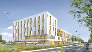 an architectural rendering of a building on a street at Ibis Budget Montpellier A&eacute;roport Parc Des Expos in Mauguio