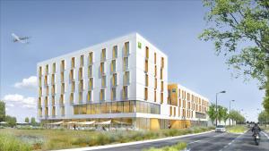 an architectural rendering of a building on a street at Ibis Budget Montpellier Aéroport Parc Des Expos in Mauguio