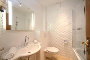 Kúpeľňa v ubytovaní Hotel Lukashansl