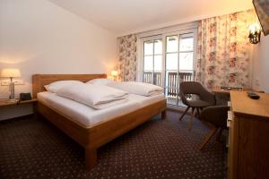 Posteľ alebo postele v izbe v ubytovaní Hotel Lukashansl