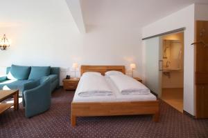 Posteľ alebo postele v izbe v ubytovaní Hotel Lukashansl