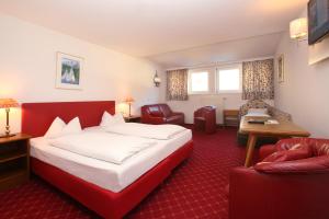 Posteľ alebo postele v izbe v ubytovaní Hotel Lukashansl