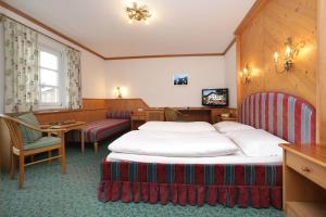 TV a/nebo společenská místnost v ubytování Hotel Lukashansl