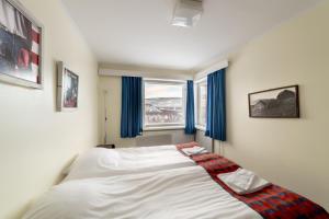 Postel nebo postele na pokoji v ubytování Hotel Utsjoki