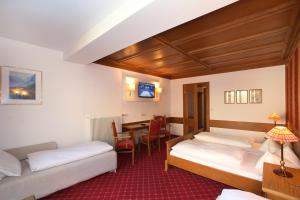 Posteľ alebo postele v izbe v ubytovaní Hotel Lukashansl