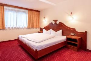 Posteľ alebo postele v izbe v ubytovaní Panorama Appartements
