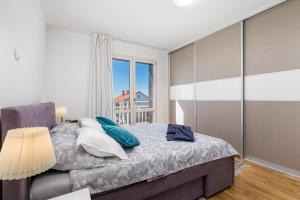 Postel nebo postele na pokoji v ubytování Villa Rožica