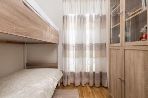 Postel nebo postele na pokoji v ubytování Villa Rožica