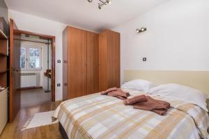 Postel nebo postele na pokoji v ubytování Villa Rožica