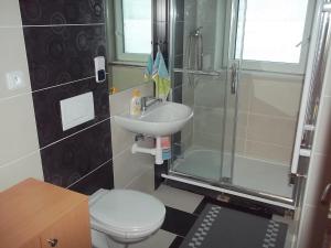 Koupelna v ubytování Penzion Apartmány Zlín