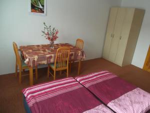 Postel nebo postele na pokoji v ubytování Penzion Apartmány Zlín