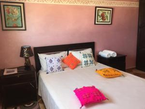 Tempat tidur dalam kamar di Kasbah Oualidia