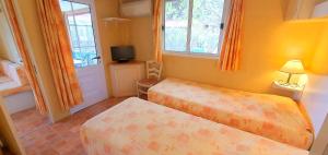 Postel nebo postele na pokoji v ubytování RESIDENCE TORRE DEL FAR