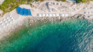 an aerial view of the beach and the ocean at Sun Gardens Dubrovnik in Dubrovnik