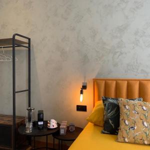 Postel nebo postele na pokoji v ubytování B&B Augusto