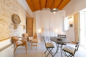 Зона вітальні в Baglio Cella - Appartamenti per Vacanze