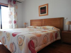Postel nebo postele na pokoji v ubytování Casa da praia 401