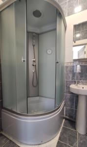 a bathroom with a shower and a sink at Bra Haus in Branev +46 photos