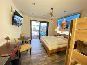 Uma cama ou camas num quarto em AVALON ideal gelegen zwischen Europapark und Rulantica