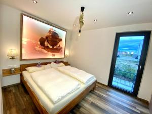 Uma cama ou camas num quarto em AVALON ideal gelegen zwischen Europapark und Rulantica