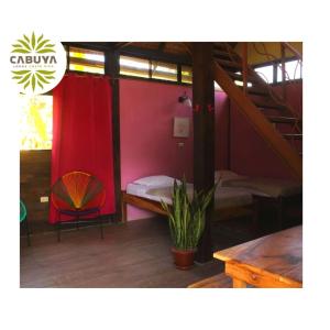 Двох'ярусне ліжко або двоярусні ліжка в номері Cabuya Lodge