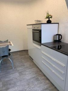 Kuchyň nebo kuchyňský kout v ubytování Ferienwohnung Haus Angela + 13 fotografií