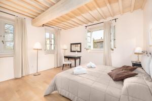 Voodi või voodid majutusasutuse B&B Borgo di Pratavecchie toas