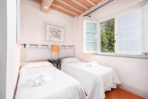 Voodi või voodid majutusasutuse B&B Borgo di Pratavecchie toas