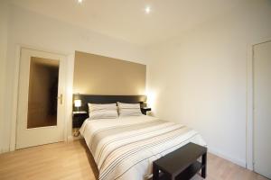 Ένα ή περισσότερα κρεβάτια σε δωμάτιο στο Central Home B&B