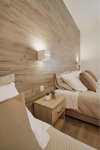 Postel nebo postele na pokoji v ubytování Hotel Orion