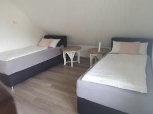 Postel nebo postele na pokoji v ubytování Apartments Metzingen Panoramablick