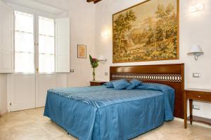 Posteľ alebo postele v izbe v ubytovaní Relais Dei Mercanti B&B And Suites