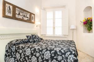 Posteľ alebo postele v izbe v ubytovaní Relais Dei Mercanti B&B And Suites