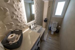 Kúpeľňa v ubytovaní Kliton Comfort Portaremounta Apartment