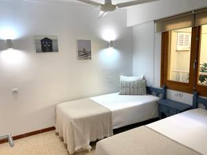 Postel nebo postele na pokoji v ubytování El Paraiso