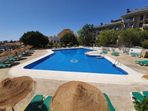 Bazén v ubytovaní Acuario Benalmádena alebo v jeho blízkosti