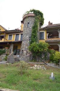 a building with ivy growing on the side of it at Apartment in Ascea - Cilento 38222 in Ascea