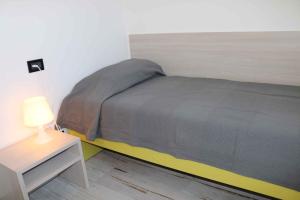 A bed or beds in a room at Apartment in Lazise - Gardasee 40490