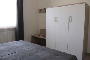 A bed or beds in a room at Apartment in Lazise - Gardasee 40490