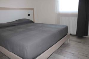 A bed or beds in a room at Apartment in Lazise - Gardasee 40490