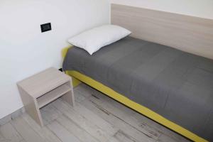 A bed or beds in a room at Apartment in Lazise - Gardasee 40490