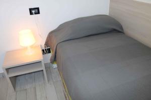 A bed or beds in a room at Apartment in Lazise - Gardasee 40490