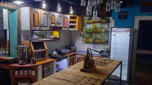 Una cocina o kitchenette en The Host Puerto Iguazú