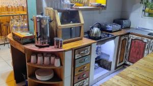 Una cocina o kitchenette en The Host Puerto Iguazú
